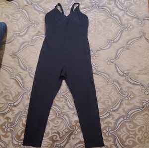 BEYOND YOGA black unitard with cross detailing in back